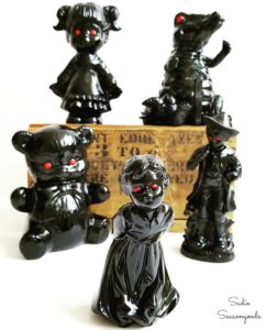 Thrift store figurines repurposed and upcycled into haunted Halloween decorations by Sadie Seasongoods