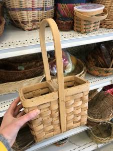 A Goodwill thrifted wicker basket to use as a resuable straw holder and decor