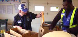 Goodwill employees sorting item and clothing donations