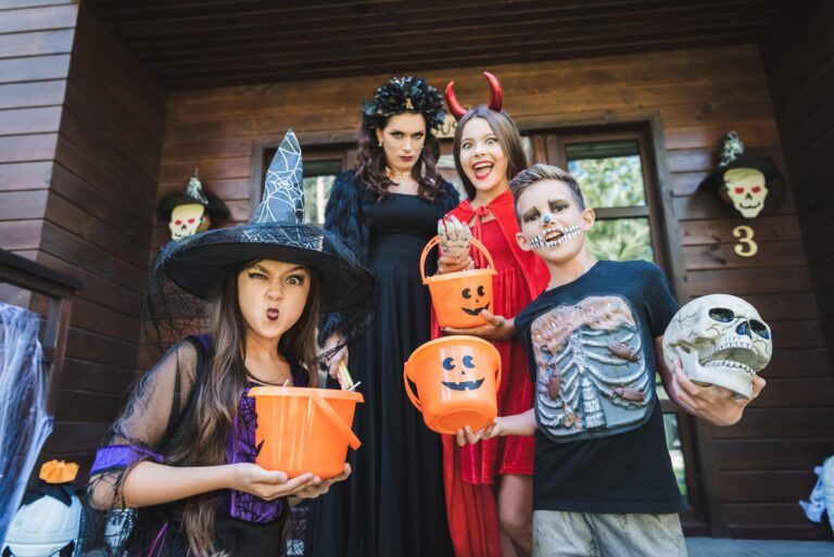 Family wearing Halloween thrift store costumes from Goodwill