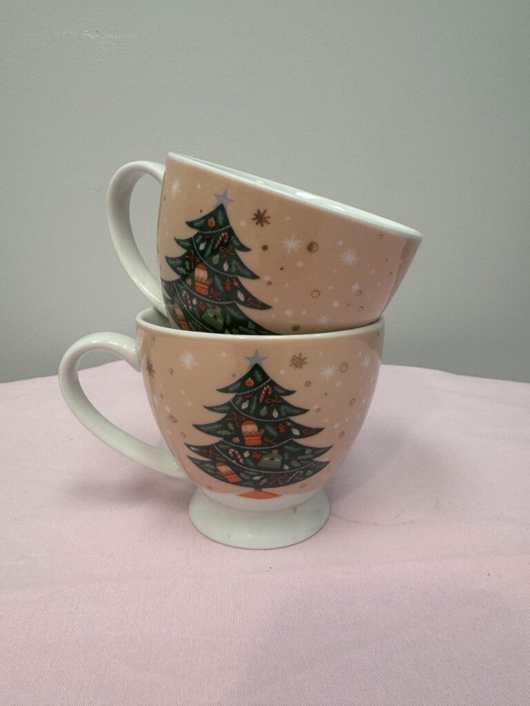 Sustainable & Affordable Thrift Gift Ideas from Goodwill Alberta 7 Two Christmas-themed decorative mugs