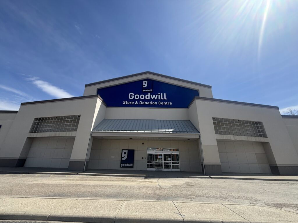 Calgary Chinook Glenmore Goodwill Thrift Store & Donation Centre exterior entrance doors.